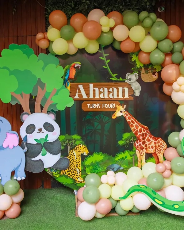 Welcome to the jungle. Our safari-themed backdrops are full of friendly animals like pandas, elephants, and snakes, set against a lush jungle scene with a custom nameplate for the birthday child.