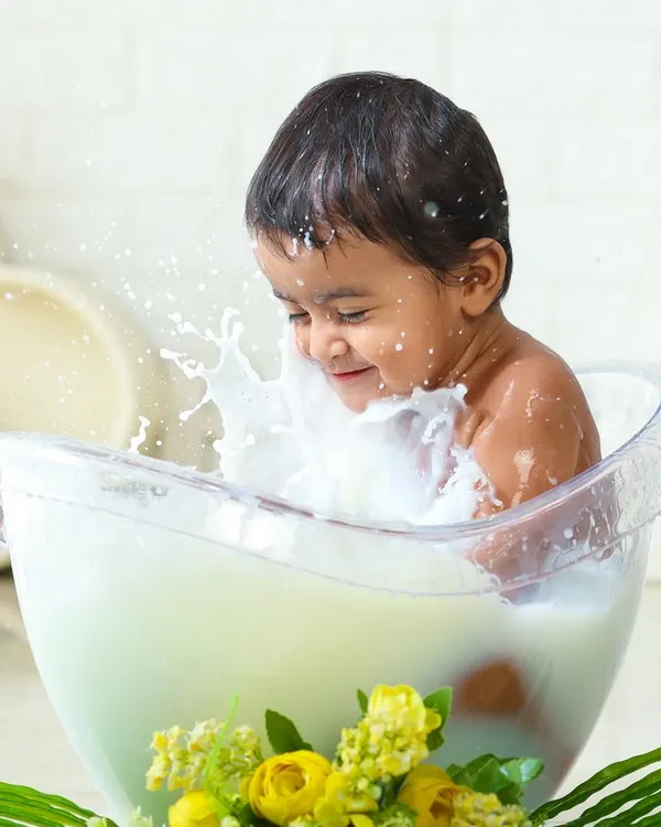 A joyful splash in the milk bath. This creative session is all about capturing pure, uninhibited fun and results in truly unique and artistic photos.