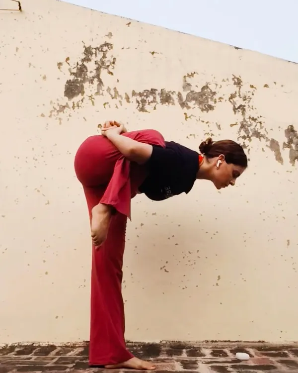 Working on the standing flamingo pose, or Marichasana. This is a bound yoga pose that challenges balance and opens the hips and shoulders. Some days are just made for binding poses.