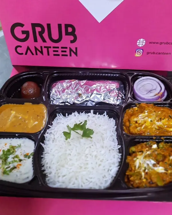 Our most loved Veg Executive Thali, packed and ready for delivery. It includes two vegetable dishes, dal, rice, roti, raita, and a gulab jamun, ensuring a balanced and delicious lunch for office goers.