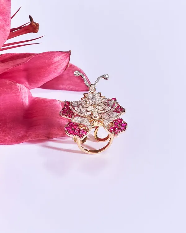 My Exotic Butterfly Ring is a masterpiece of innovation. Set with fiery rubies and scintillating diamonds, its articulated wings flutter with every movement, capturing the magic of a butterfly in flight.