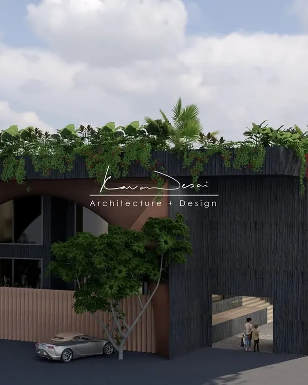 Here, the interplay of form and texture is everything. The strong arch creates a dramatic opening, while the contrast between the dark, textured facade and the smooth, earthy tones adds depth and character.