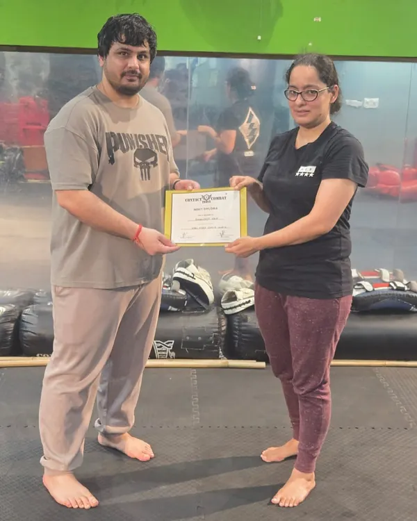 Celebrating another student who has earned her certification. Her hard work and dedication are an inspiration to everyone in the class.