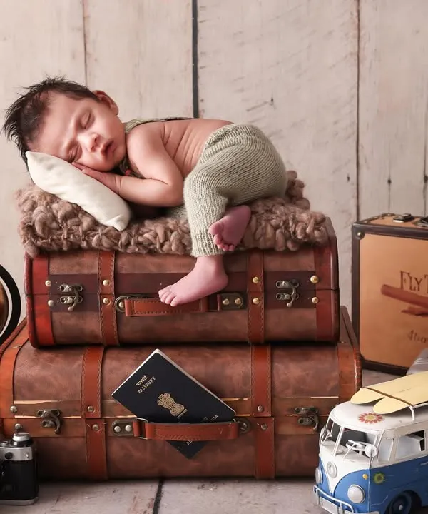 Ready for a lifetime of adventure. This vintage traveler theme is one of my favorites for newborns. With antique-style suitcases, a globe, and a toy plane, we create a scene that tells a story of future explorations.