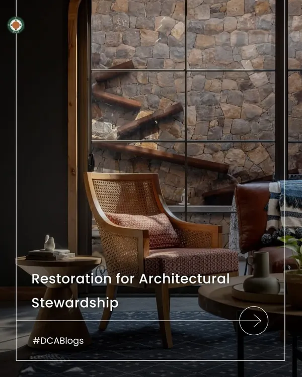 Our blog on restorative design explores how working with what already exists offers environmental responsibility and emotional resonance. This image captures the essence of that philosophy, where a modern chair sits against a backdrop of natural, weathered stone.