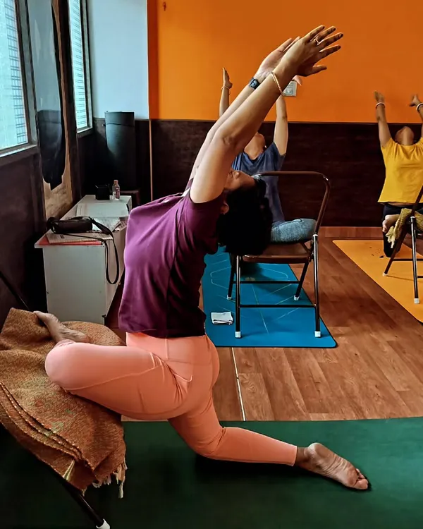 My philosophy is that yoga should fit your body, not the other way around. Here, I am demonstrating how a simple chair can help achieve a deep, safe Anjaneyasana or low lunge, opening the hips and chest without straining the knee. This is the essence of adaptive yoga.