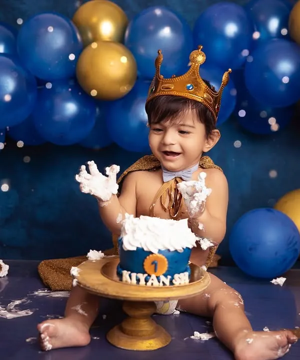 The pure joy of a first birthday cake smash! This little prince couldn't have been happier, and capturing that laughter amidst the frosting is what makes these sessions so special.