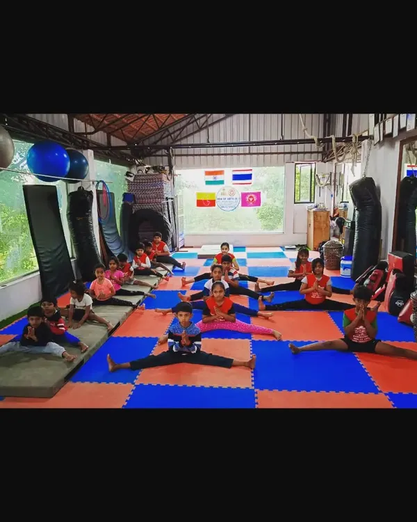 A look inside one of our kids' gymnastics classes. Here, the students are working together on their middle splits, a key component of building flexibility.