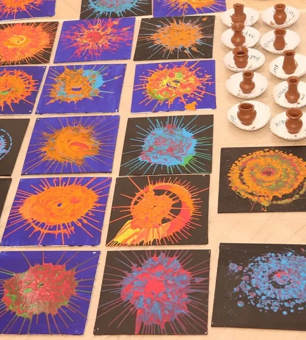 A beautiful display of spin art and miniature pottery creations. These activities show how scientific principles like centrifugal force and material science are the basis for beautiful art.