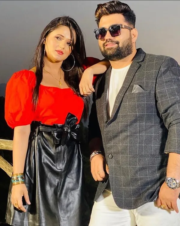 A still from the Haryanvi romantic song 'Pyaar Ke Parindey'. I styled Anjali Raghav in a bold red top and a faux leather skirt with a bow detail, creating a modern and chic look for her.