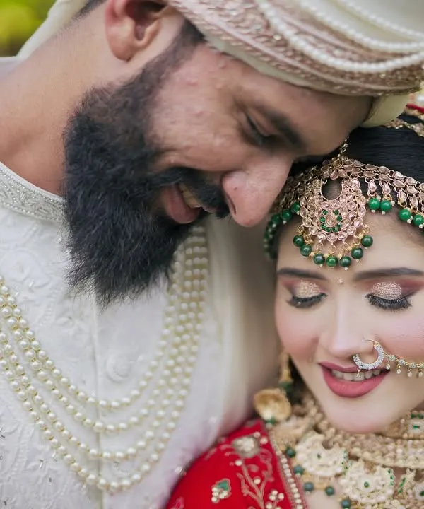 This is the moment we chase. Not a pose, but a feeling. A quiet breath between a husband and wife, lost in their own world on their wedding day.