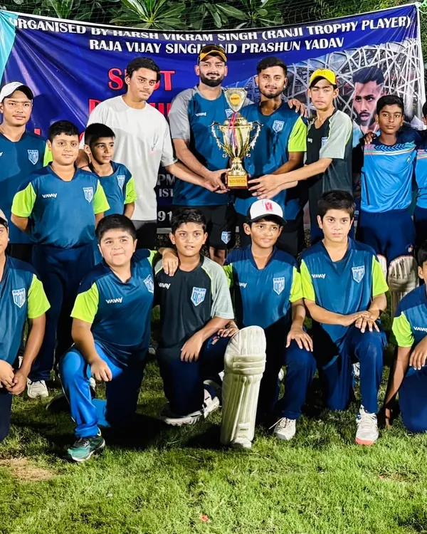 Champions. The Delhi Cricket Hub team posing with the trophy after another tournament win. This is what teamwork looks like.