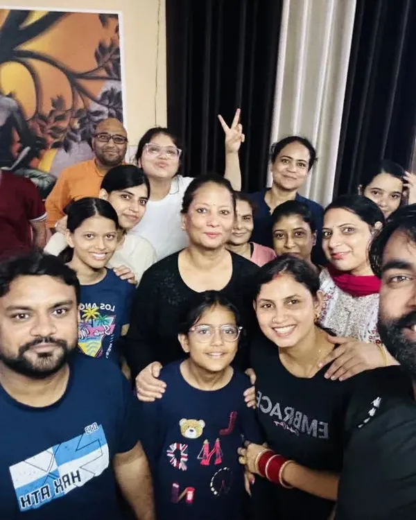 A happy selfie with our yoga family after a fulfilling session. The smiles and sense of connection are just as important as the asanas.
