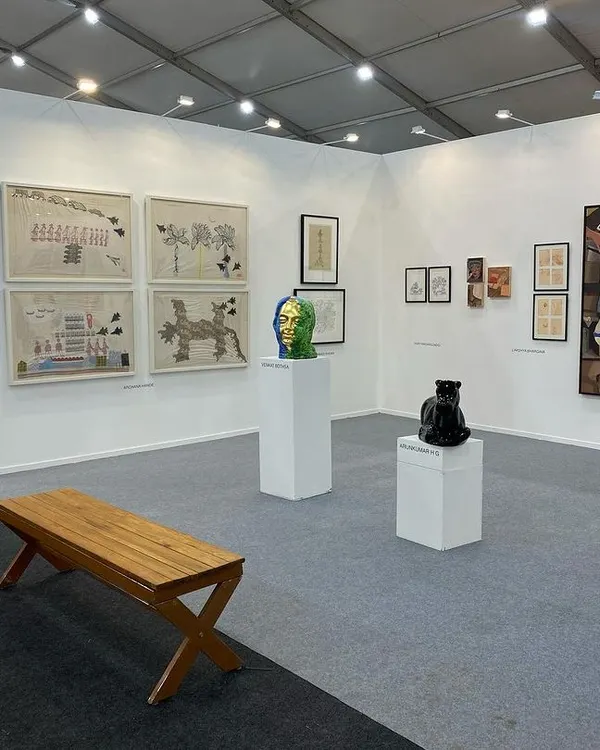 A view of our booth at Art Mumbai, showcasing a diverse range of works including sculptures by Arunkumar H G and Venkat Bothsa, and embroidered works by Archana Hande.