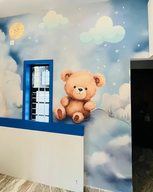 I created this gentle and dreamy mural for a nursery. A cute teddy bear sits on soft clouds under the moon and stars, making for a comforting and sweet environment for a young child.