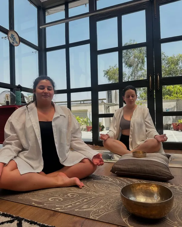 A moment of deep relaxation for my students from Armenia during a sound healing session. The Tibetan bowls help calm the mind and balance the body's energy.