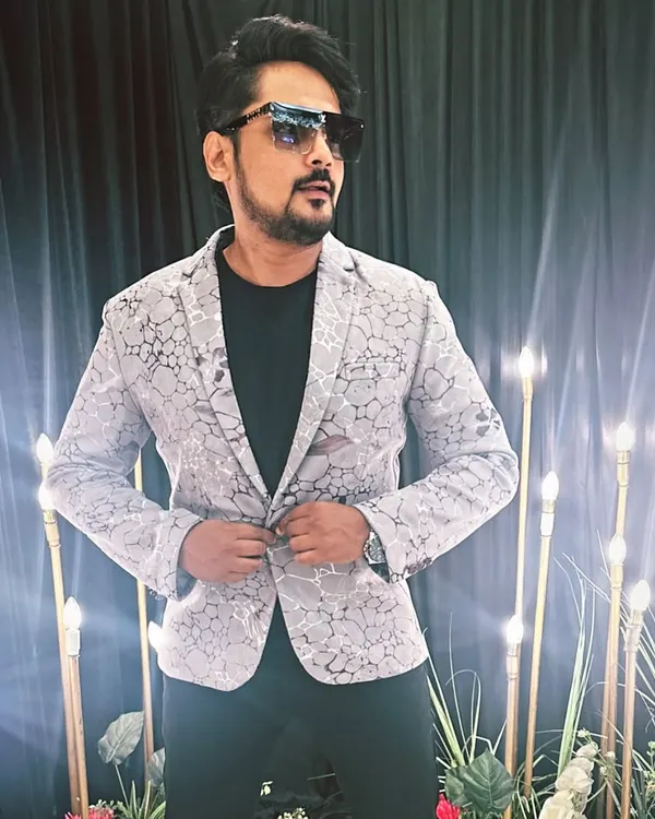 Confidence is the best outfit. Here I am, ready for a show in a stylish blazer, embodying the self-made journey of an event emcee.