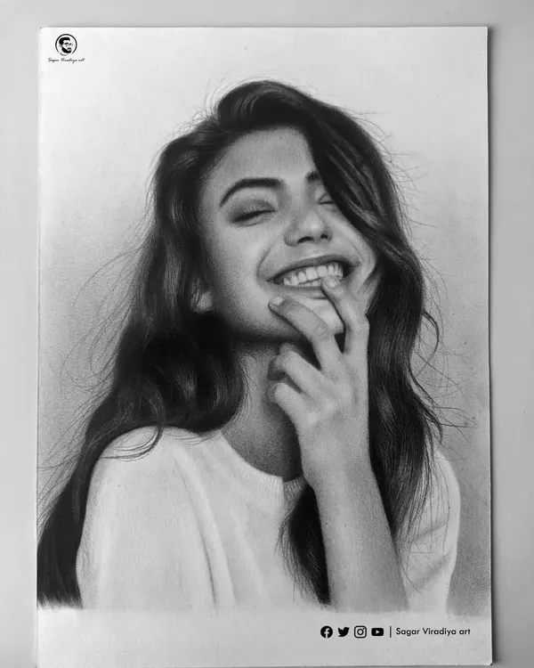 A portrait sketch created during one of my online drawing classes, demonstrating how to capture a joyful and natural expression. I used a mix of Artline graphite and Camlin soft charcoal on Brustro paper to achieve both soft tones and deep darks.
