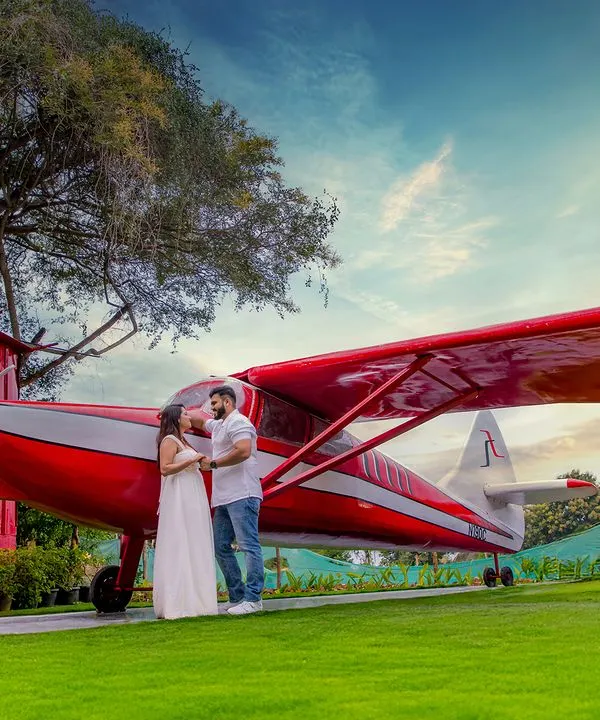 This real red airplane is one of our most popular and unique backdrops, perfect for creating standout pre-wedding or fashion photos that you won't find anywhere else in Bangalore.