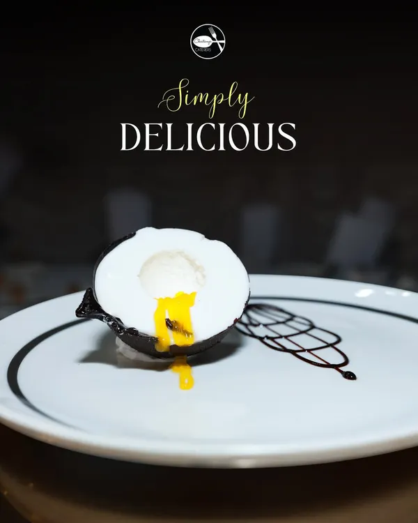 Break into my Mango Coconut Shell dessert to reveal a luscious mango center. This dessert is a tropical dream, combining the silky smoothness of coconut with the zesty sweetness of mango in a visually stunning presentation.