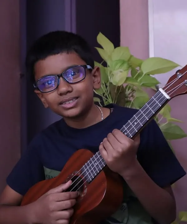 Finding their rhythm, one chord at a time! This is a glimpse of a student's happy ukulele journey at our academy.
