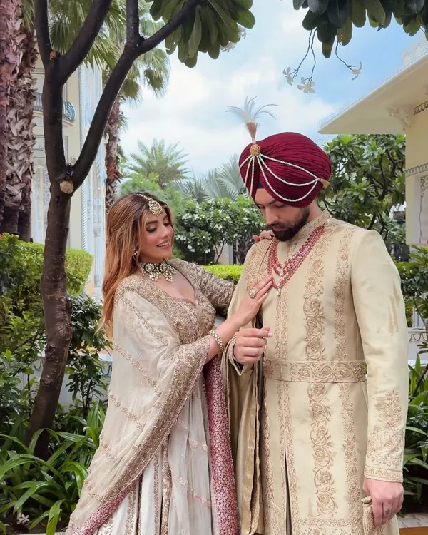 The beauty is in the details. I focus on the small things, like how the groom's ruby necklace subtly picks up the border of the bride's dupatta, creating a connected and thoughtfully styled look.