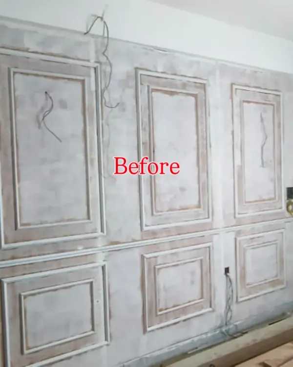 This is the wall before I started, with the basic wainscoting frames installed and ready for finishing. This shows the first step in preparing the wall for the final wallpaper application.