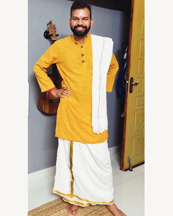 Dressed in a traditional Vesti. I find that wearing simple, natural-fiber clothing is most conducive for my yoga practice and for life.