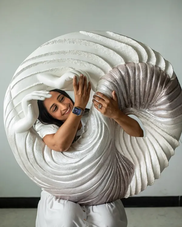 This is a moment of pure connection with my art. 'The Awakening Cycle' is more than a sculpture; it's a journey of inner transformation brought to life through texture and form, using upcycled paper to create something with soul.