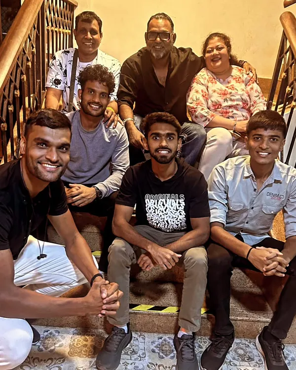 The coaching staff and team members enjoying a moment of relaxation together. We believe in building strong relationships off the field, which translates to better chemistry on it.