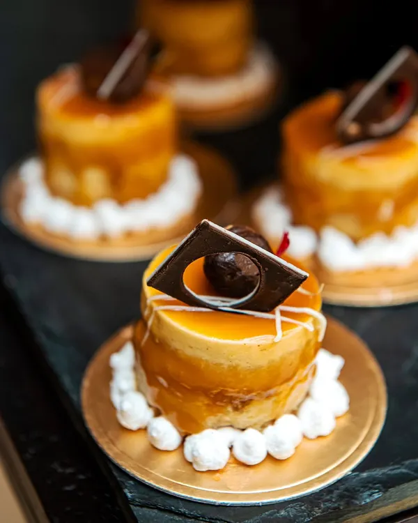 A beautiful mini caramel mousse cake, showcasing our pastry team's skill.