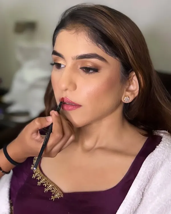 A bridal behind-the-scenes moment. The focus and precision that goes into creating the perfect lip shape.