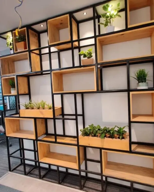 We are proud to share this completed commercial interior project for the healthcare brand "Healthians." This custom-built partition of metal and wood adds a natural and open feel to the office space.