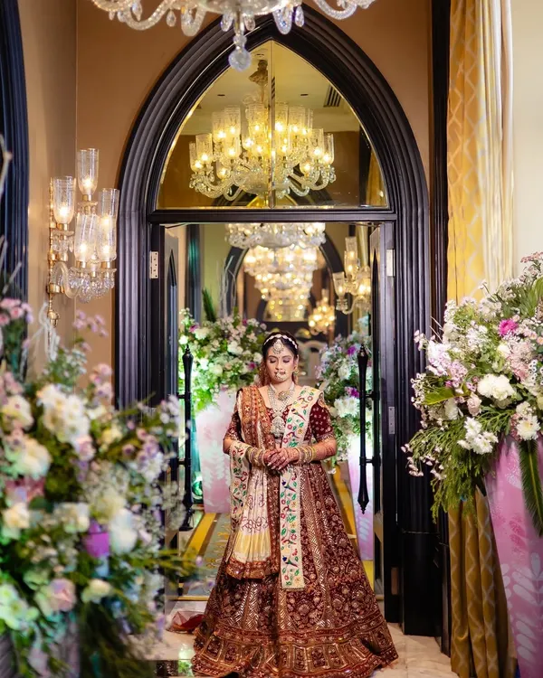 A bride's majestic entrance at the iconic Taj Mahal Palace. We focus on creating these breathtaking, magazine-worthy bridal portraits that feel both royal and deeply personal.