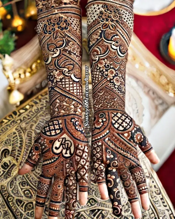 This is what full bridal henna dreams are made of. I love creating these super detailed, intricate designs that go all the way up the arm, and personalizing them with the couple's initials, like the 'AR' monogram I included here.