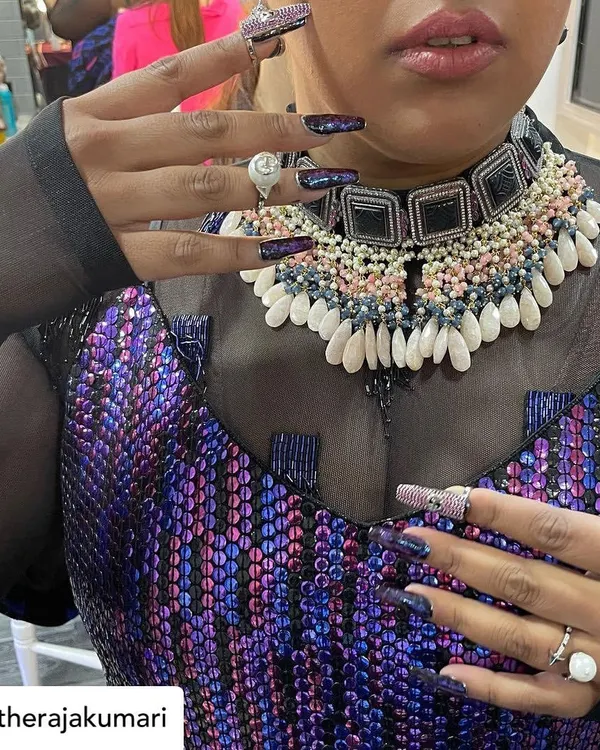 A close-up of the custom nails I created for The Raja Kumari to match her stunning Manish Malhotra outfit. The deep purple and black design has a shattered glass effect.