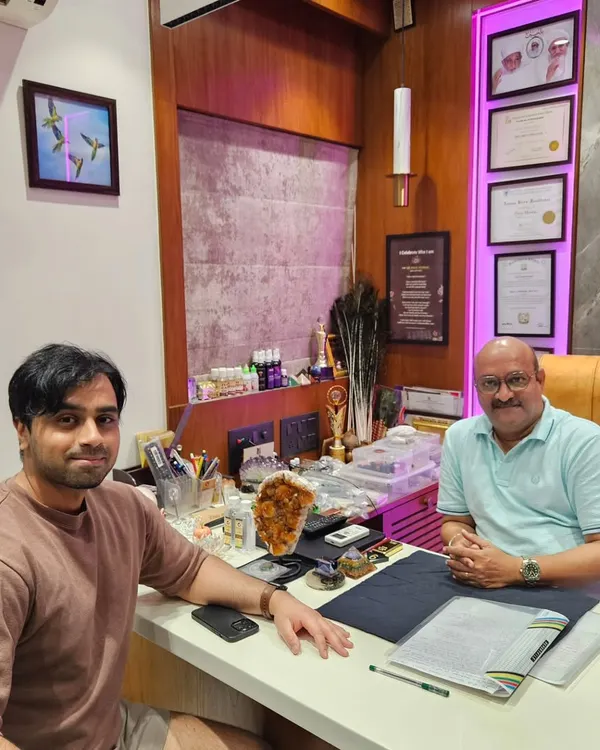 A one-on-one session with a client in my office. Each consultation is a deep dive into an individual's life chart to provide clarity and actionable remedies.