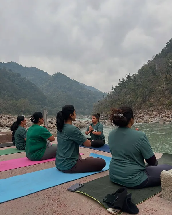 A moment of collective stillness as our group meditates together on the banks of the Ganga. Guided by an instructor, we find our focus amidst the natural beauty of Rishikesh, allowing the sounds of the river to deepen our practice.