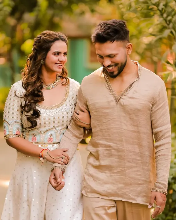 A candid shot of a happy couple from a destination wedding in Lonavala. I styled the groom with a modern textured haircut and gave the bride long, flowing waves for a natural and elegant look that lasted all day.