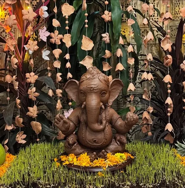 Our studio comes alive during Ganesh Chaturthi. This eco-friendly idol, made from our own studio clay, sits at the heart of our celebration, surrounded by offerings and decorations created by our community.