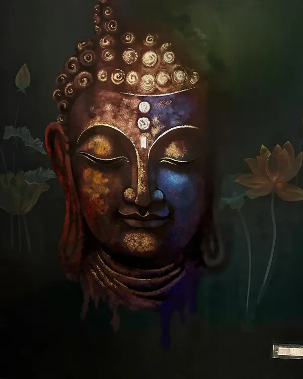 A closer look at our gold foil work on the Buddha portrait. This technique adds a divine shimmer and texture that catches the light beautifully, making the artwork feel alive. It's a special touch we offer for unique projects.