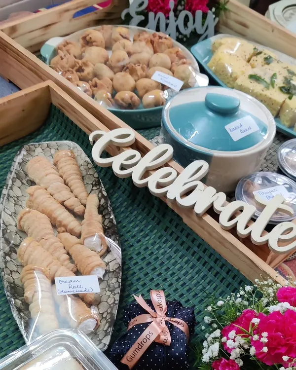 This is what we love to do: bring food and celebrations together. This custom catering spread features a variety of our handmade cream rolls, savoury puffs, and fresh dhokla, all ready to delight your guests.