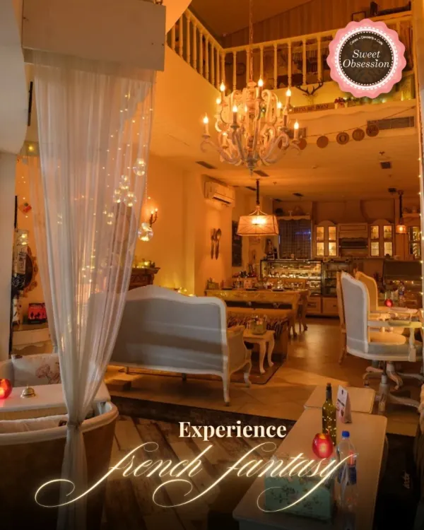 This is the French fantasy I dreamed of bringing to life. The two-level layout with its elegant chandelier and cozy seating invites you to explore and find your favorite spot.