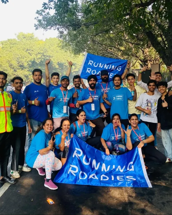 The whole Running Roadies crew together after supporting the Delhi Half Marathon. We travel across cities to support major running events, bringing our unique Bengaluru energy everywhere we go.