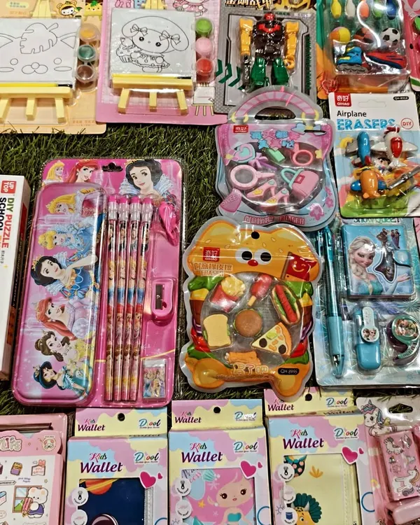 This is a great overview of the small, budget friendly stationery items I keep. You can see princess themed pencil sets, mini wallets, fun erasers, and small paint sets that are perfect for party favor bags.