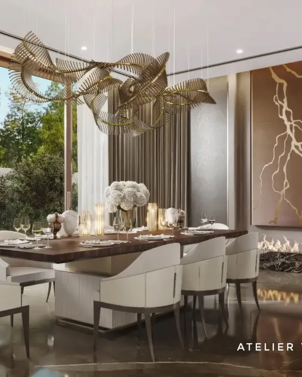An alternate view of the farmhouse dining room, this time highlighting the custom leather art wall above the marble fireplace. The design creates a warm and inviting atmosphere, perfect for elegant dinners.