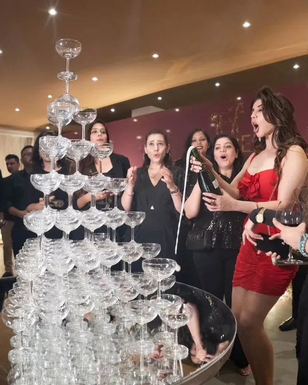 The highlight of a 15th-anniversary celebration for Fennel Living. A grand champagne tower creates a moment of collective celebration and excitement, perfectly capturing the spirit of a major milestone.