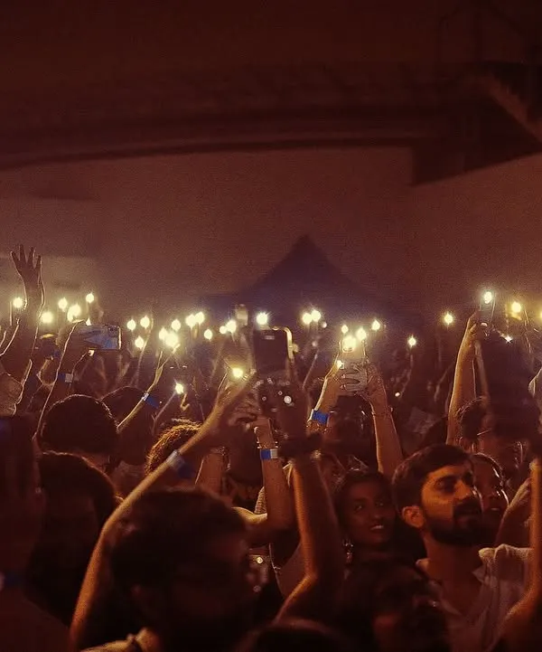 A sea of lights from the crowd at the White Party. This image perfectly captures the magic and unity we strive to create, where the audience becomes part of the show.