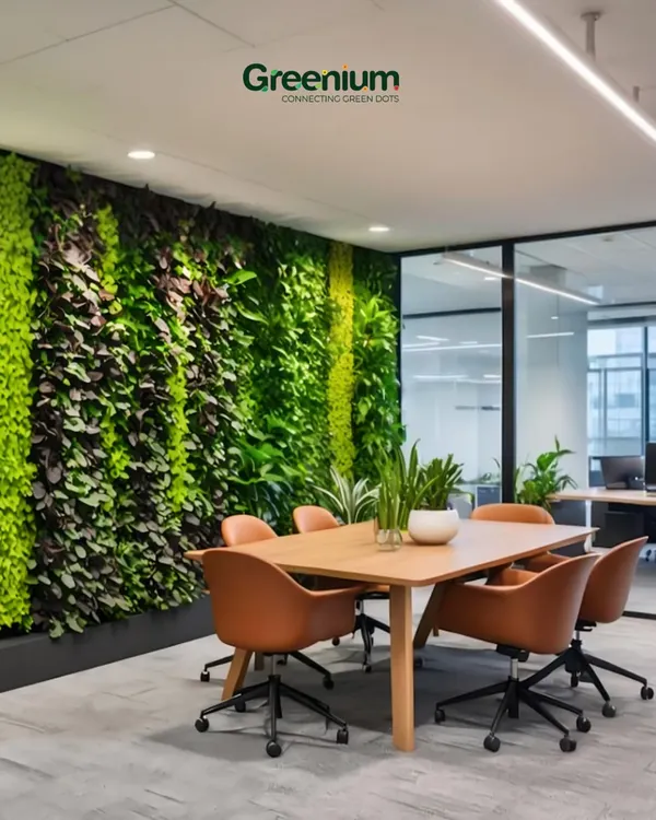 This office meeting room features a floor-to-ceiling living wall, creating a calm and inspiring atmosphere. Biophilic design elements like this have been shown to improve focus and creativity in a work setting.