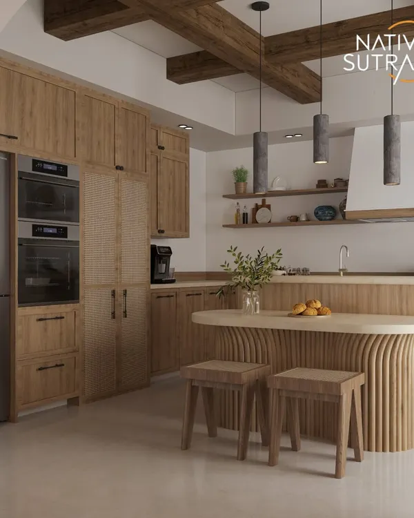 A warm and inviting kitchen that blends Modern Farmhouse and Organic Modern styles. This view highlights the sculptural, fluted breakfast island, rustic wood cabinetry, and integrated modern appliances.